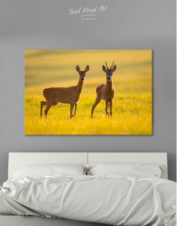 Two roe deers on glade Canvas Wall Art