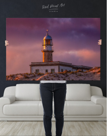 Lighthouse Under a Cloudy Sky Canvas Wall Art - image 1