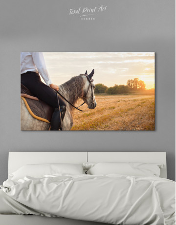 Horseback Riding in a Field at Sunset Canvas Wall Art