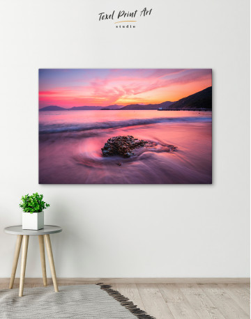 Rock in a Wavy Sea under an Orange and Pink Sky at Sunset Canvas Wall Art - image 5